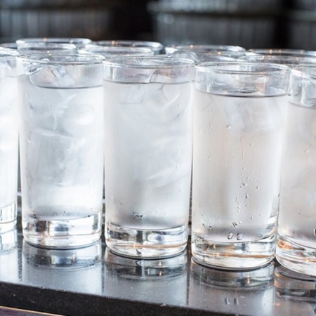 background; beverage; blue; bottle; bubbles; clear; close-up; closeup; cold; condensation; cool; crystal; cube; drink; drop; freeze; fresh; frost; full; glass; ice; liquid; natural; nature; object; pure; purity; reflection; refreshing; refreshment; summer; transparent; water; wet; white